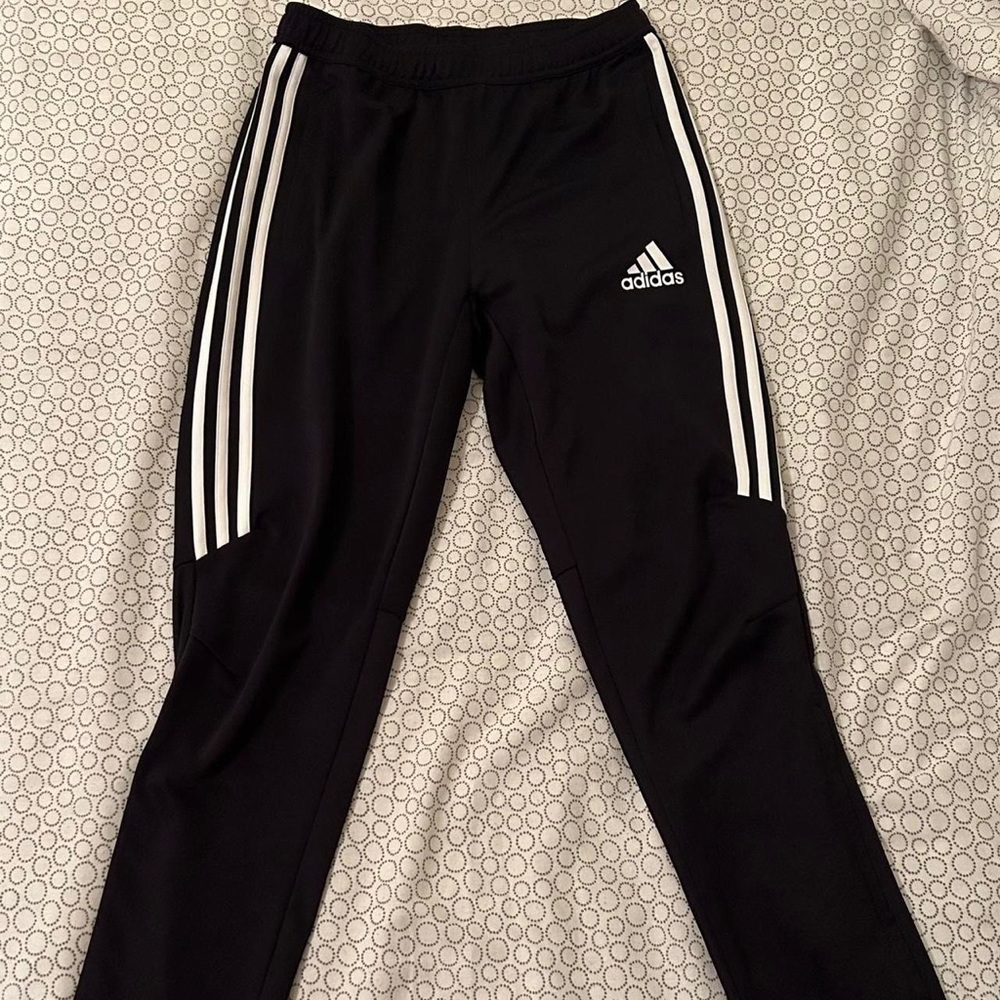 adidas sweatpants, half stripes down leg with zipper at the bottom of each leg